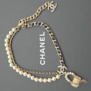 #112 Chanel Coco Mark, Matelasse Bag Motif, Faux Pearl, and Leather - B21SAB6125